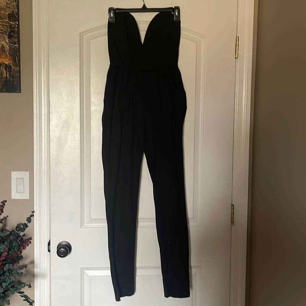 Jumpsuit size Large but fits like a Medium